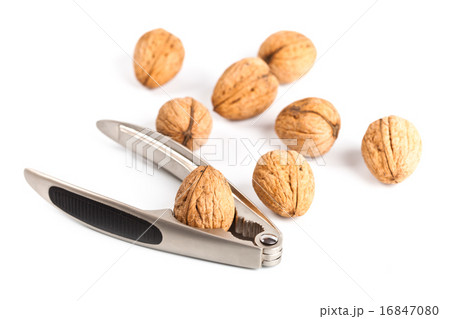 walnuts and nutcracker walnuts and nutcracker 16847080
