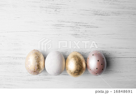Easter eggs on rustic wooden table.  16848691