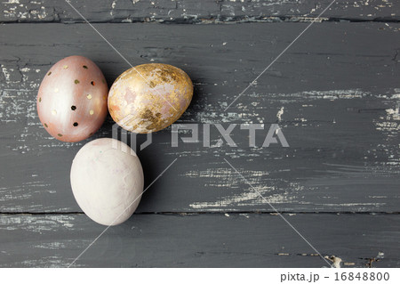 Easter eggs on wooden table. Holiday background Easter eggs on wooden table. Holiday background 16848800
