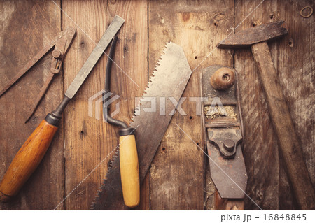 Od vintage hand tools on wooden background. 16848845
