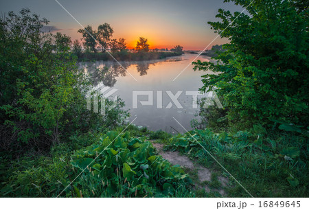 Colourful sunset on the river 16849645