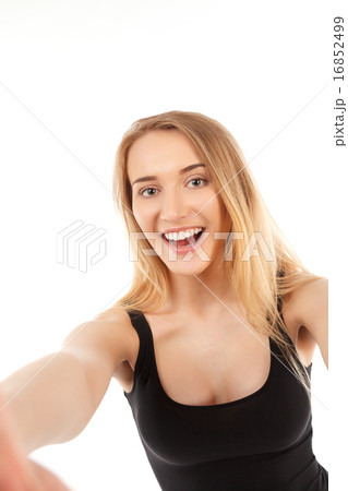 young pretty blonde women taking selfie 16852499