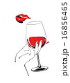 Playful red lips and glass of wine holding hand 16856465