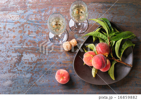 Peaches on branch with champagne Peaches on branch with champagne 16859882