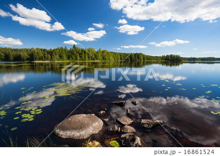 Sunny lake landscape from finland Sunny lake landscape from finland 16861524