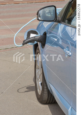 Charging an electric car Charging an electric car 16862278