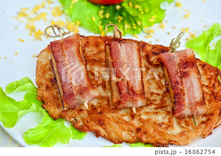 veal meat with bacon 16862754