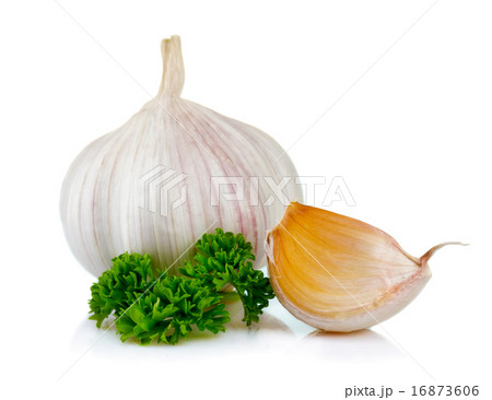 Garlic and parsley leaves isolated on white 16873606