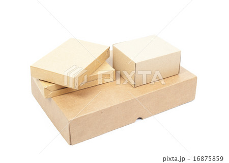 Small brown cardboard boxes stacked Small brown cardboard boxes stacked 16875859