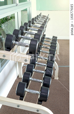 Rows of dumbbells in the fitness room Rows of dumbbells in the fitness room 16877685