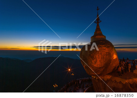 Golden Rock at twilight with praying people, KyaiKhtiyo pagoda, Golden Rock at twilight with praying people, KyaiKhtiyo pagoda, 16878350