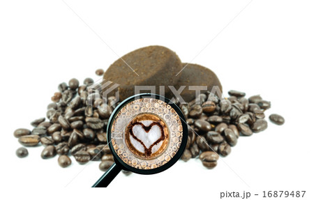 magnifying glass with background of roasted coffee beans to be c magnifying glass with background of roasted coffee beans to be c 16879487
