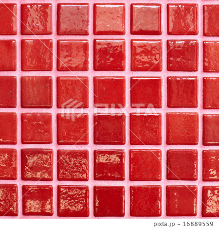 Wall tiled with red tiles 16889559