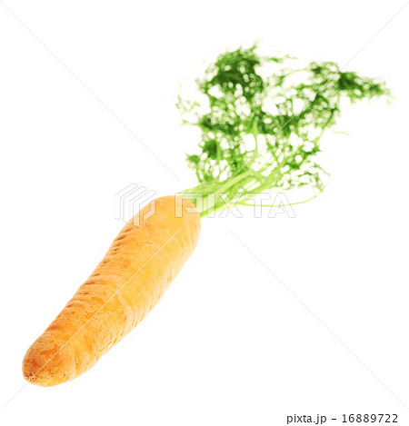 Unpeeled carrot with the green top isolated 16889722