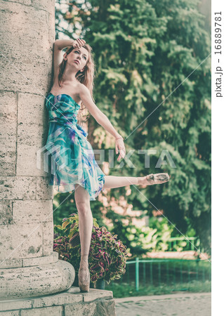 Graceful ballerina dancing 16889781