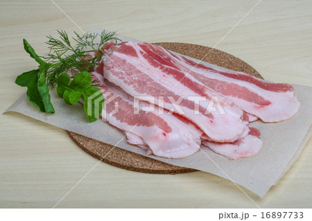 Raw bacon 16897733