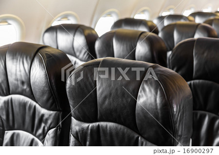 Airplane seats in the cabin 16900297