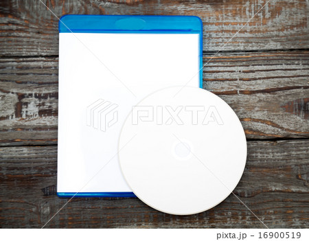 Blank compact disc with cover on wood background ground Blank compact disc with cover on wood background ground 16900519