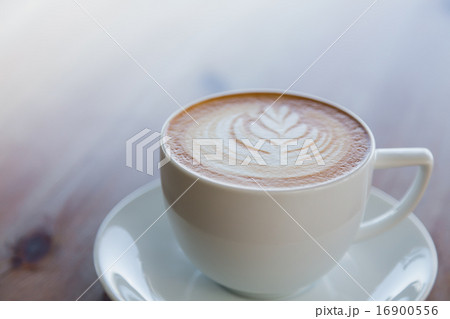 Latte Coffee art on the wooden table Latte Coffee art on the wooden table 16900556