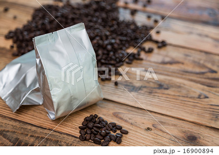 New coffee foil bag on wood table New coffee foil bag on wood table 16900894