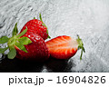 Ripe red strawberries on a slate background 16904826