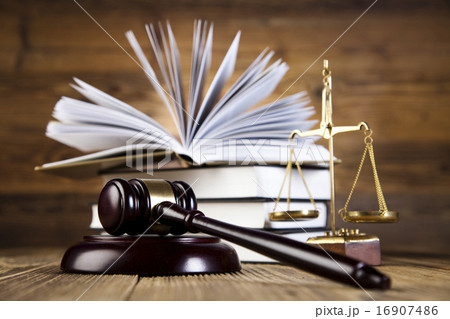 Gavel on books, ambient light vivid theme Gavel on books, ambient light vivid theme 16907486