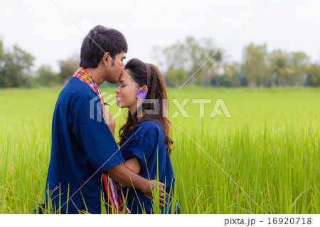 Couple Thai farmer on rice fields Couple Thai farmer on rice fields 16920718