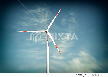 Wind turbine on blue sky. With toning effect 16921602