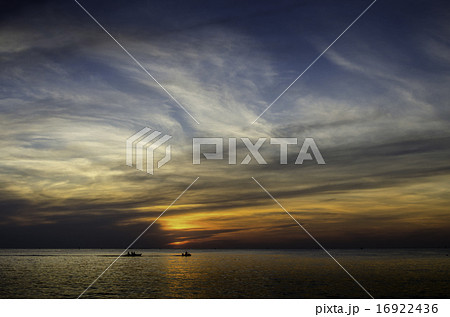 Silhouette of sportsman with jet ski at sea Silhouette of sportsman with jet ski at sea 16922436
