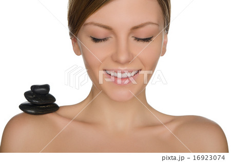 pile stones on shoulder of beautiful 16923074