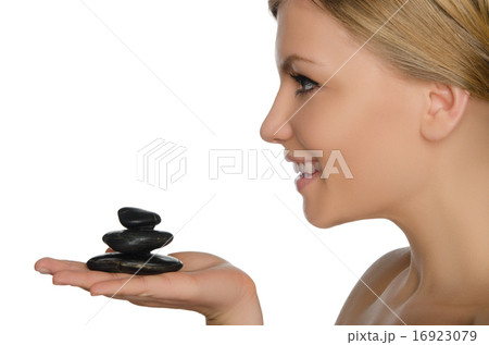 beautiful woman holding stones on palm beautiful woman holding stones on palm 16923079