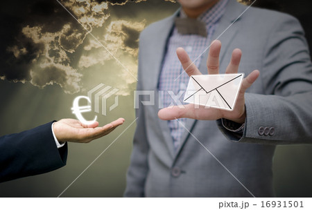 Businessman trading news with euro money Businessman trading news with euro money 16931501