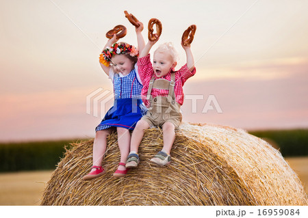 Kids playing in wheat field in Germany Kids playing in wheat field in Germany 16959084