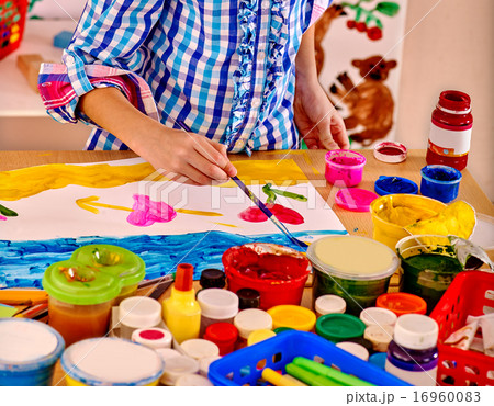 Child making decoration card.. Child making decoration card.. 16960083