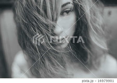 Portrait of a beautiful red-haired girl 16979901