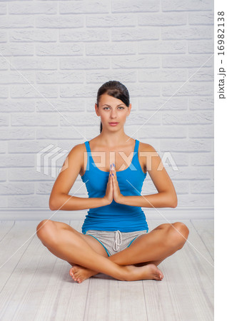 The girl is engaged in yoga 16982138