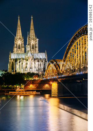Night View Of Cologne Cathedral And Hohenzollern Bridge, Germany Night View Of Cologne Cathedral And Hohenzollern Bridge, Germany 16986142
