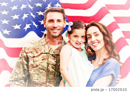 Composite image of soldier reunited with family Composite image of soldier reunited with family 17002010
