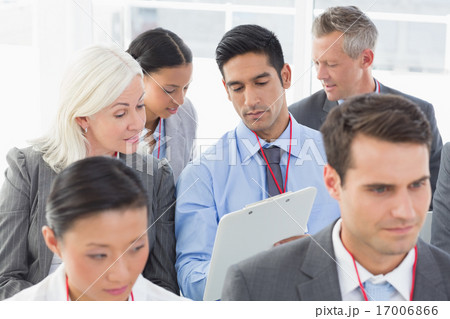 Business people listening during meting Business people listening during meting 17006866