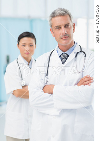 Confident male and female doctors 17007165