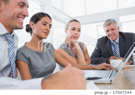 Concentrated business team during meeting Concentrated business team during meeting 17007244