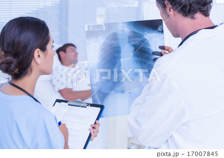 Doctors checking patients xray 17007845