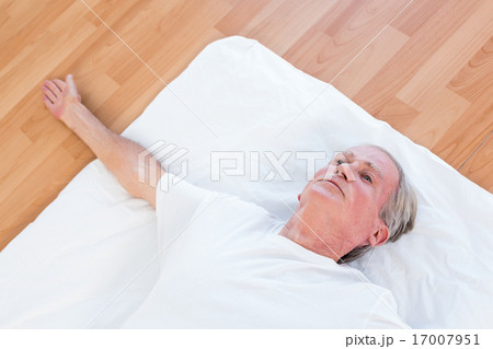 Old man relaxing with open eyes Old man relaxing with open eyes 17007951