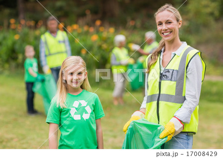 Happy family collecting rubbish 17008429