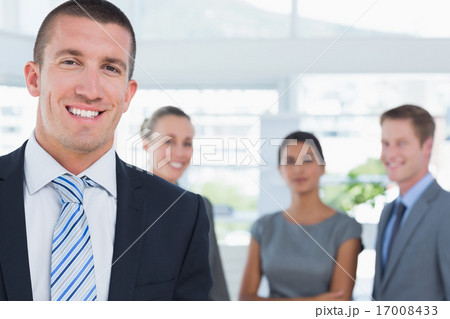 Businessman smiling at camera 17008433