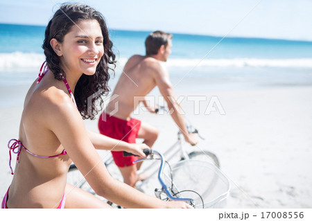 Happy couple going on a bike ride 17008556