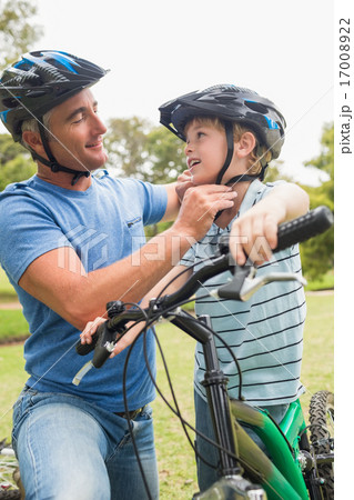 Father on a bike with his son 17008922
