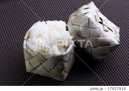 Sticky rice (Glutinous rice) in bamboo container Sticky rice (Glutinous rice) in bamboo container 17027916
