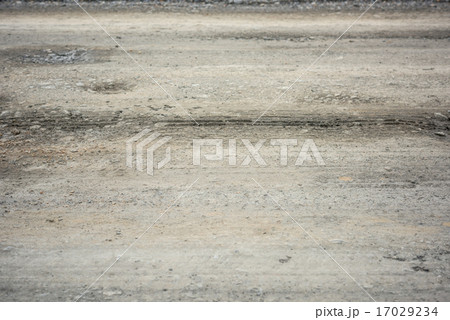 rough bumpy stone road in rural 17029234