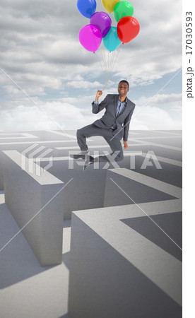 Composite image of businessman flying with balloons Composite image of businessman flying with balloons 17030593